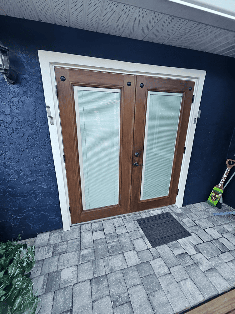 Double wooden French doors with blinds