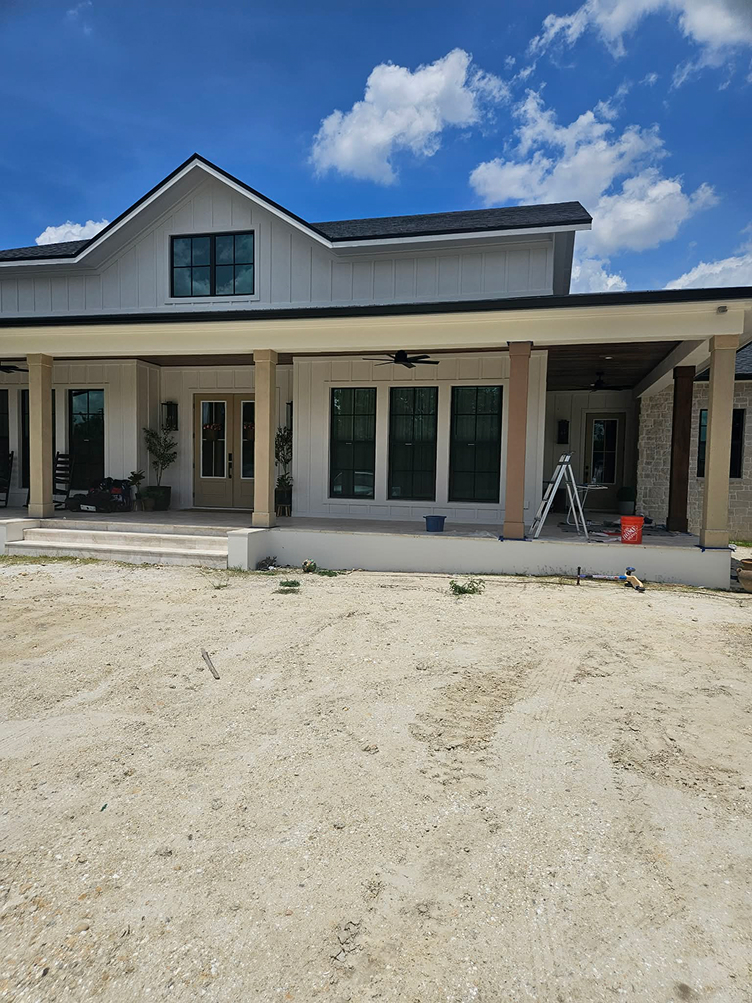 Modern farmhouse with wide covered porch Modern farmhouse with wide covered porch