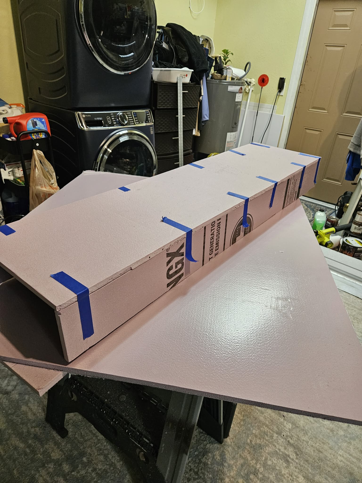 Pink foam insulation boards on worktable Pink foam insulation boards on worktable