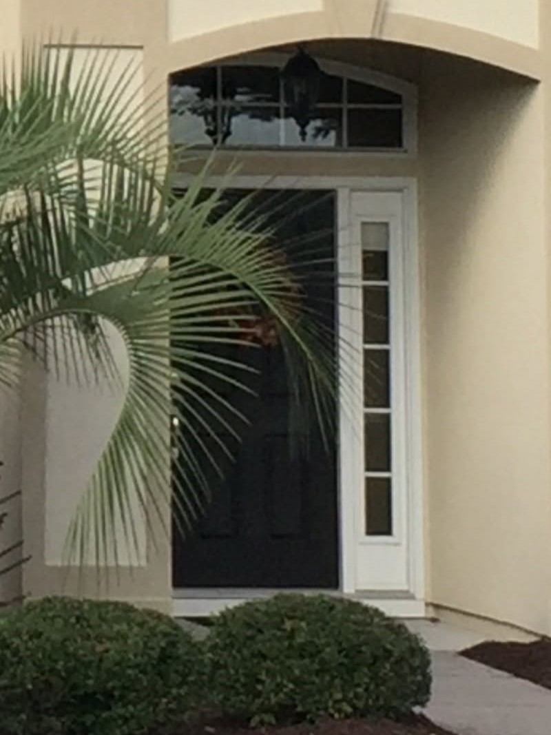 Front entrance with black door and sidelight Front entrance with black door and sidelight